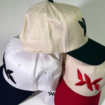 Multiple DNA Strand snapback hats displayed together, showcasing different colorways from IAC Lyfestyle.