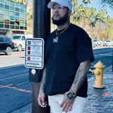 Model wearing black DNA Strand Logo oversized t-shirt by IAC Lyfestyle